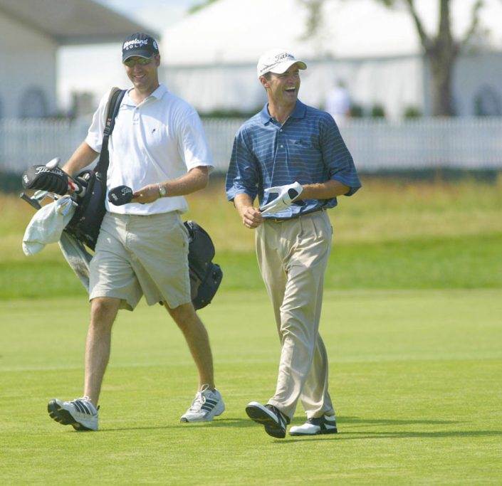 Casey Bourque laughing with brother in fairway