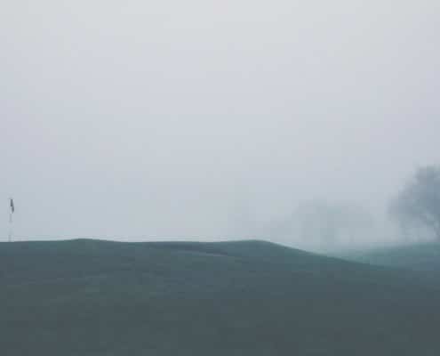 golf course in the fog